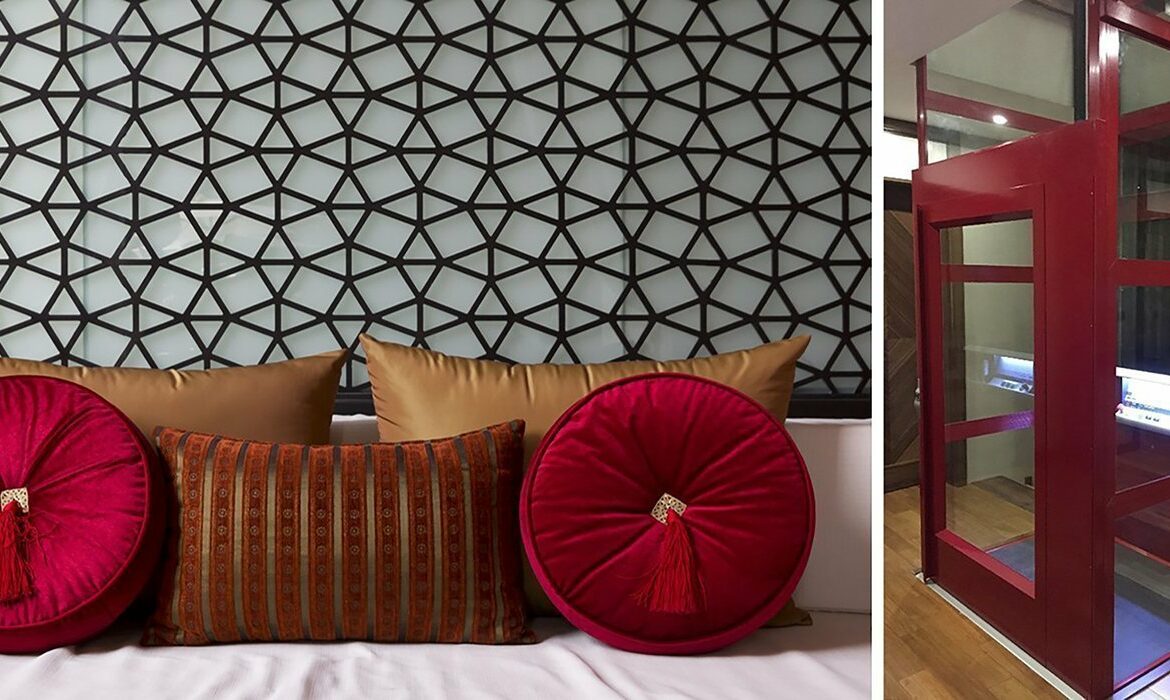 Sisustussuunnittelua punaisella korostuksella ja kaunis punainen Cibes hissi.