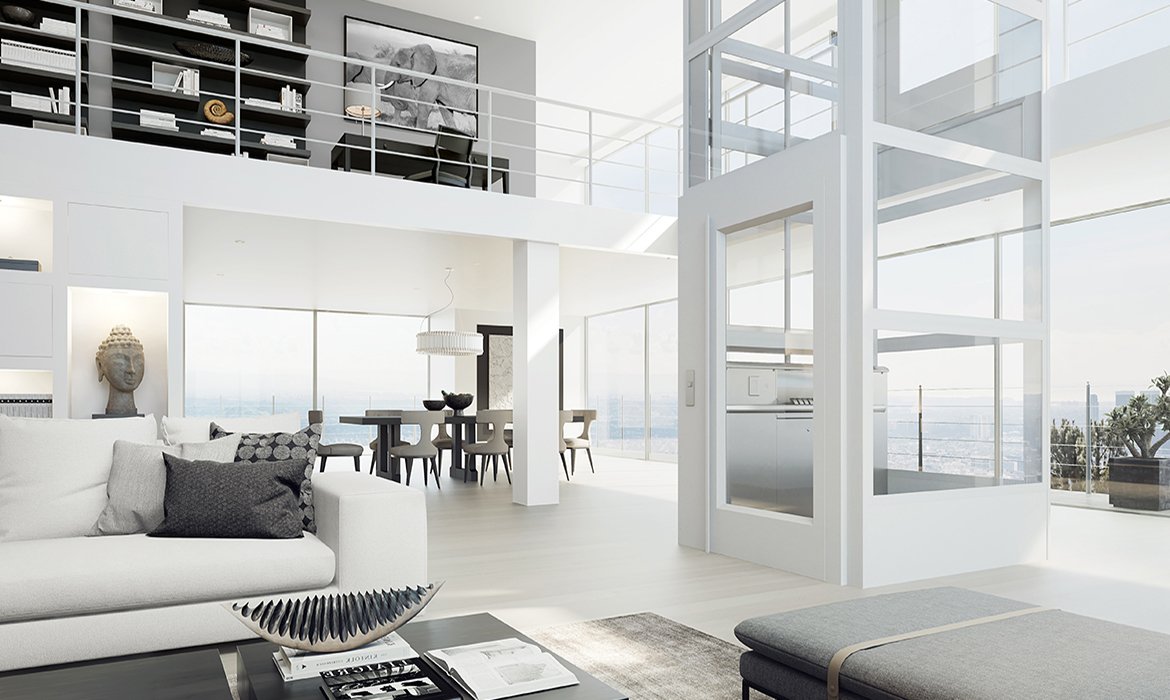 Glass lift with panoramic shaft in clear glass